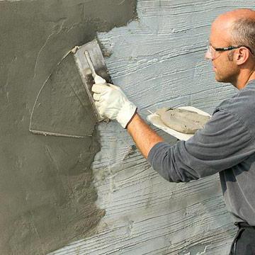 a aplicação de cimento-areia, gesso