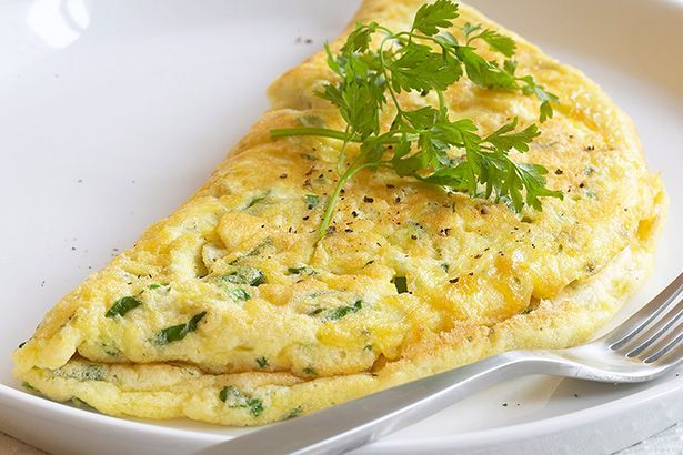 Scrambled eggs with greens