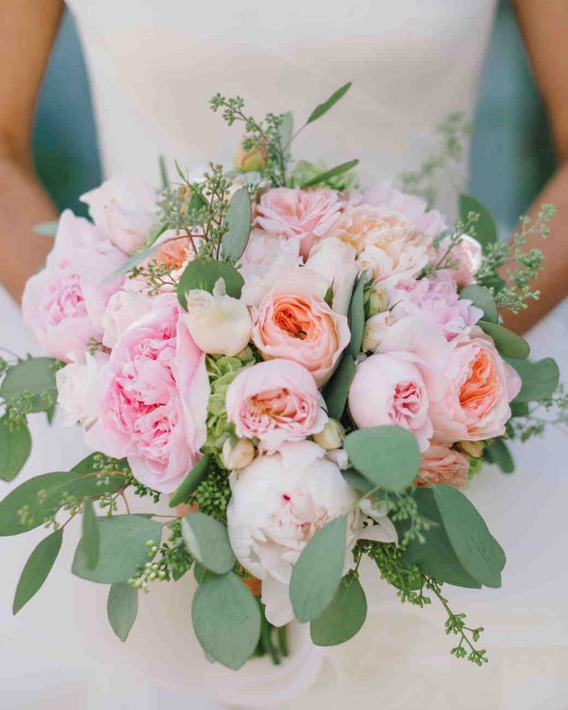a Bouquet of white and delicate pink roses