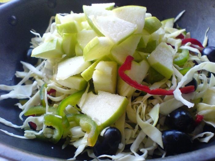 salad from fresh cabbage with Apple