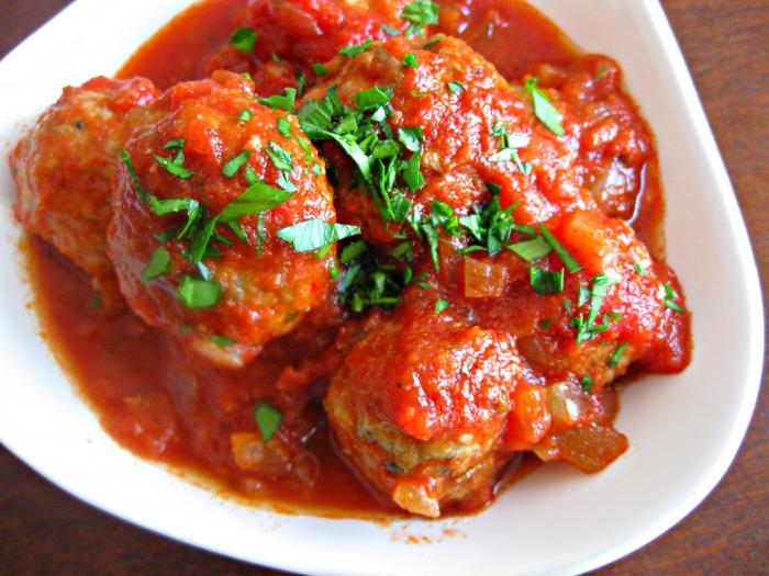 meatballs in tomato sauce in a slow cooker