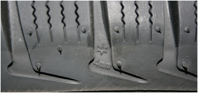 індикатор зносу протектора шини bridgestone