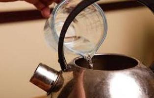 clean the enamel kettle from scale