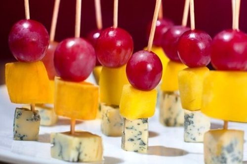 Canapés with cheese for a holiday table