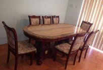 Dining table oval sliding: advantages and disadvantages