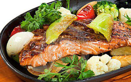 fish under the vegetables in a slow cooker