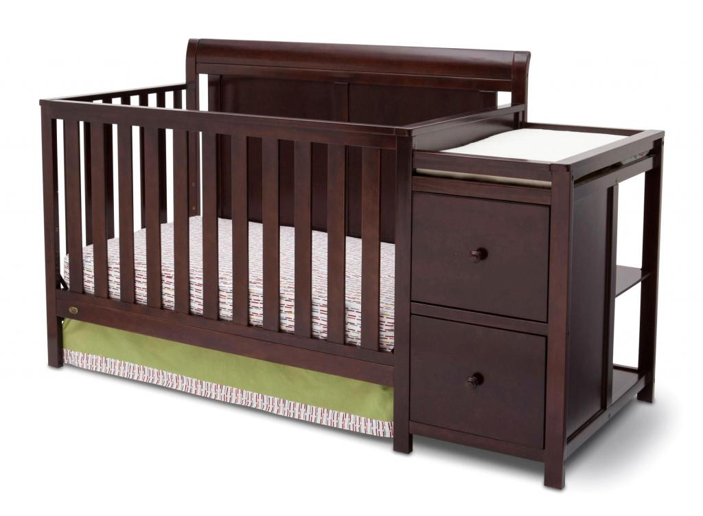 Crib convertible with changing table