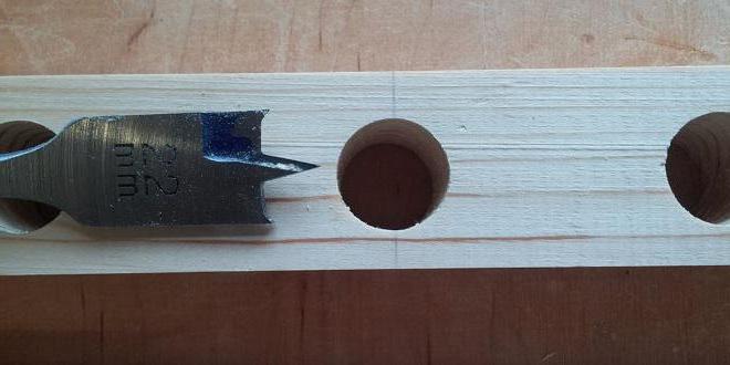 drill pen on wood