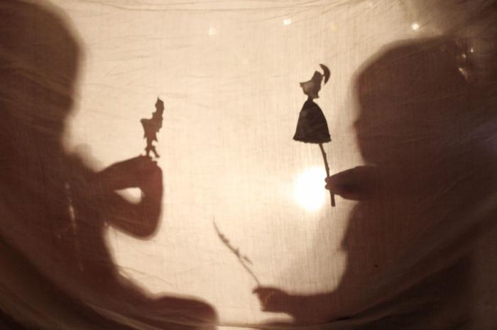 shadow theater with their hands