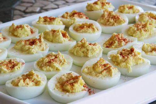 dishes of boiled eggs and cheese