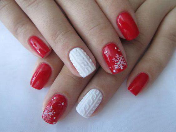 manicure in red color gel lacquer photo