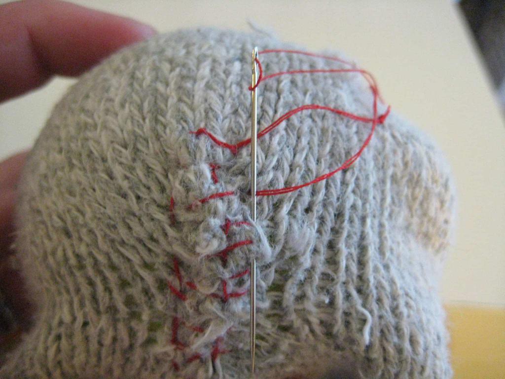 cómo coser un calcetín