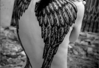 Hidden symbolism tattoo wings