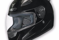 Snowmobile helmet with a heated glass - protection