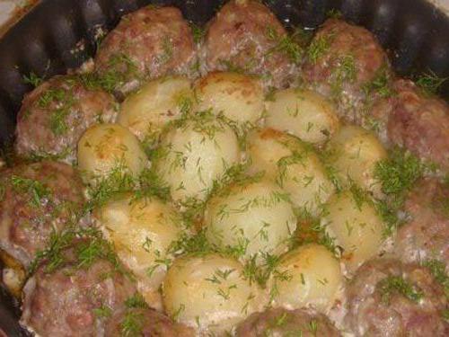 Potatoes with cutlets in the oven