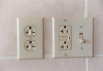 The outlet in the bathroom. Waterproof socket with cover. Features of the unit