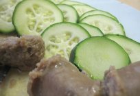 Delicious stewed zucchini in a slow cooker with meat and vegetables