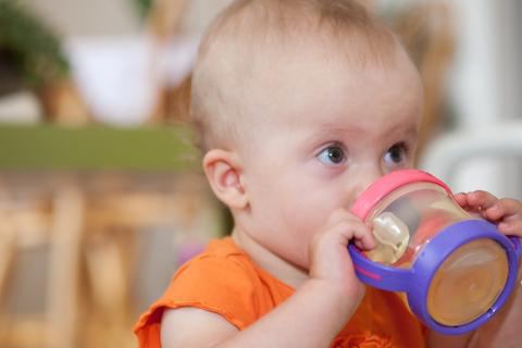 How to teach baby to drink from a mug independently