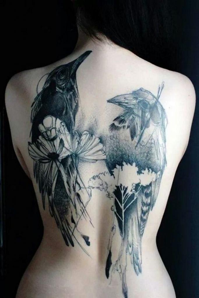 Tattoo on the back of a bird