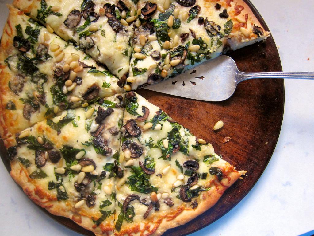 Pizza with mushrooms and spinach