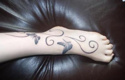 was bedeutet Schmetterling Tattoo auf dem Bein