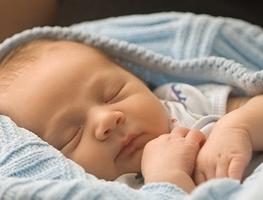how to teach baby to sleep through the night