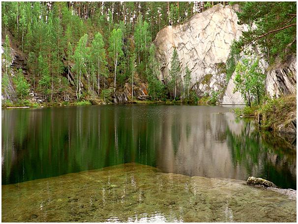 o Lago Тальков Pedra