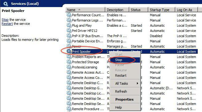 the status of the printer is disabled how to enable Windows 7