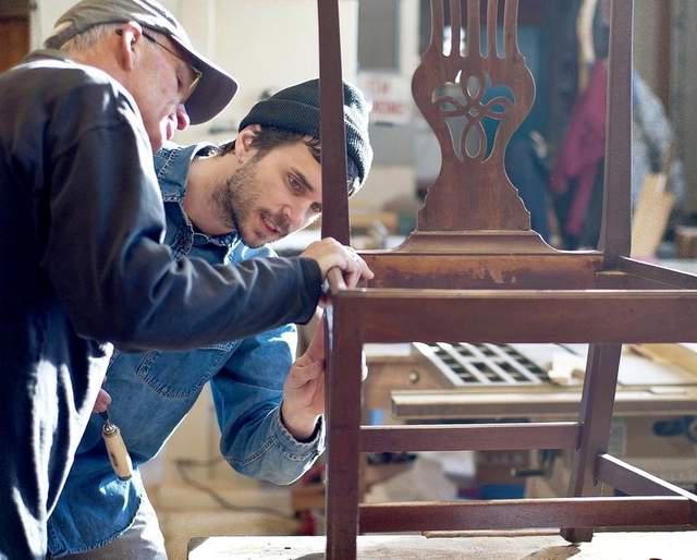 restoration of furniture with his hands