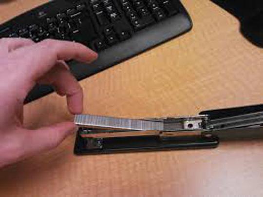 how to insert the staples into the stapler