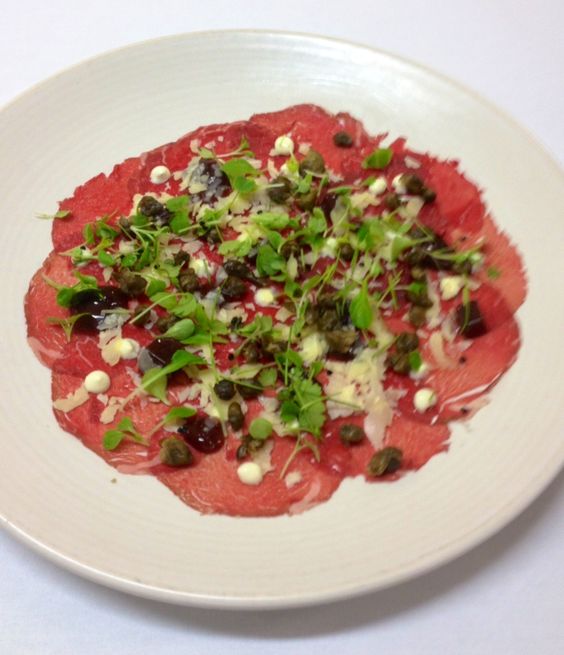 beef Carpaccio with olives and herbs