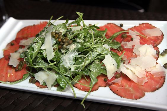 Carpaccio with herbs and Parmesan cheese