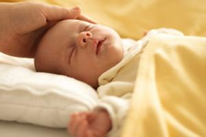 why does a month-old baby regurgitate a lot