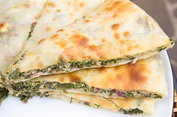 Ossetian pie with cheese and herbs