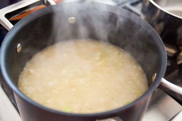 Classic recipe pilaf with beef in a pot