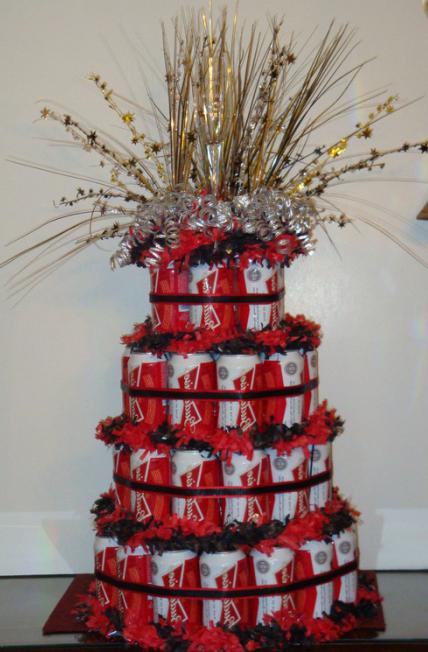 a Cake made out of beer cans with their hands