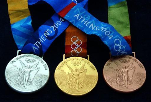 वजन एक ओलंपिक स्वर्ण पदक की