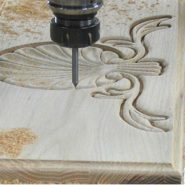 hand-engraver on wood