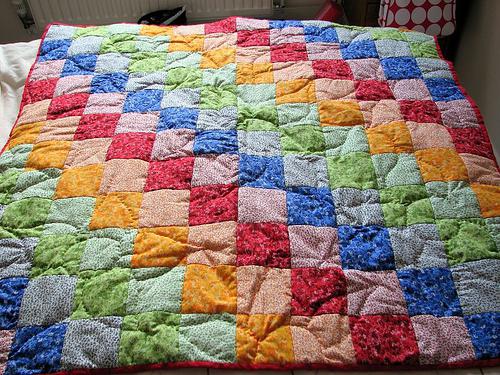 bedspread patchwork with their hands