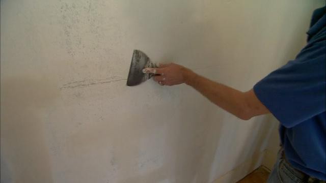 repair painting of walls or Wallpaper