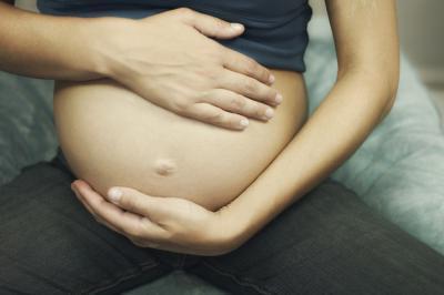 how to tighten skin on belly after childbirth