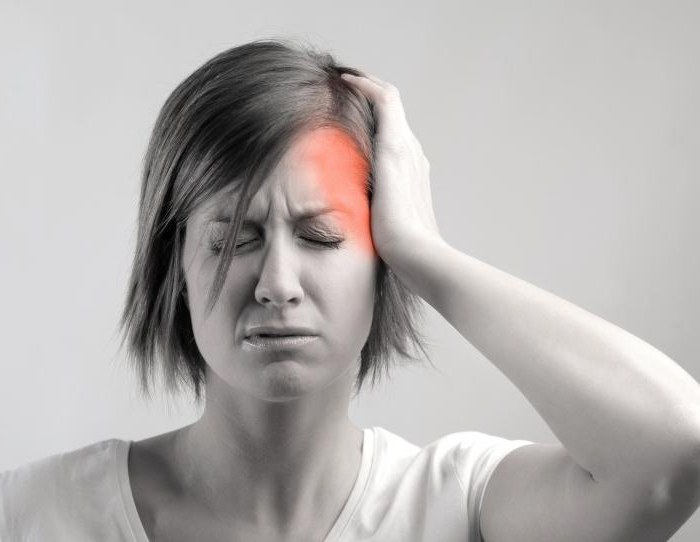 have a headache before menstruation causes and treatment